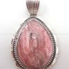 Navajo tear drop shaped rhodochrosite and stering silver pendant