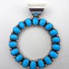 Zuni turquoise and sterling silver cut out circle pendant