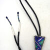 Santo Domingo multi-stone inlay and sterling silver bolo tie with lapis and turquoise featuring beaded tips by Jeffrey Tenorio