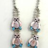 Zuni pink conch, turquoise and jet inlay and sterling silver owl necklace and earring set