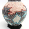 Mata Ortiz handmade, etched and painted polychrome hummingbird and flower jar by Octavio Silveria