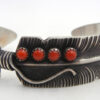 Navajo brushed sterling silver and coral feather cuff bracelet by Chris Charley