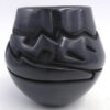 Santa Clara black etched and polished avanyu jar by Vicki Martinez
