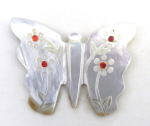 Zuni carved mother of pearl butterfly fetish with coral accents by Cheryl Beyuka