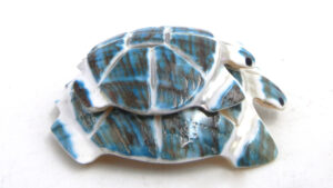 Zuni Cheryl Beyuka Carved Sea Snail Shell Piggy Back Turtles