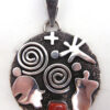 Navajo round sterling silver and coral petroglyph style pendant by Alex Sanchez