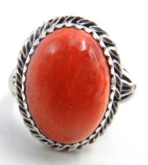 Navajo reddish orange spiny oyster shell and sterling silver ring by Delbert Delgarito