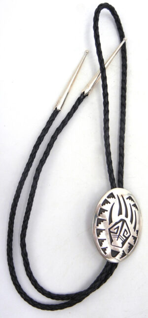 Hopi sterling silver overlay bear paw bolo tie with step and feather patterns