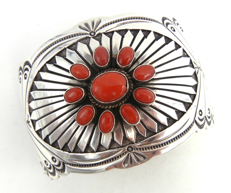Navajo sterling silver and coral concho style cuff bracelet with wide sterling silver shank