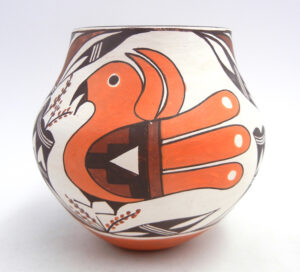 Acoma handmade and hand painted polychrome parrot design jar with weather and feather patterns by Marie Juanico