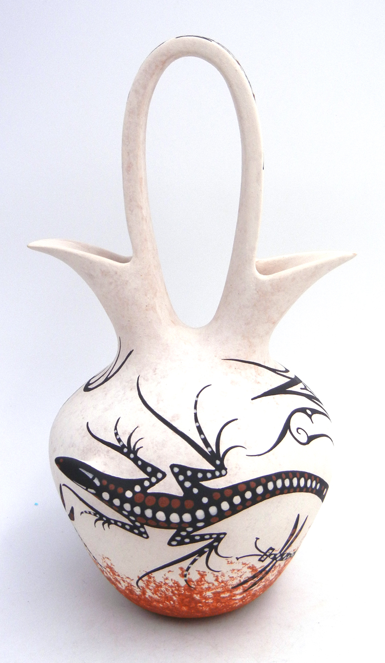 Zuni handmade and hand painted multi-animal pattern wedding vase by Deldrick Cellicion