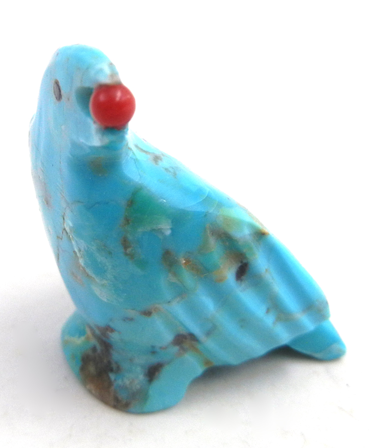 Zuni carved turquoise magpie fetish with coral berry by Calvert Bowannie