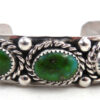 Navajo green turquoise and sterling silver row cuff bracelet by Elroy Chavez
