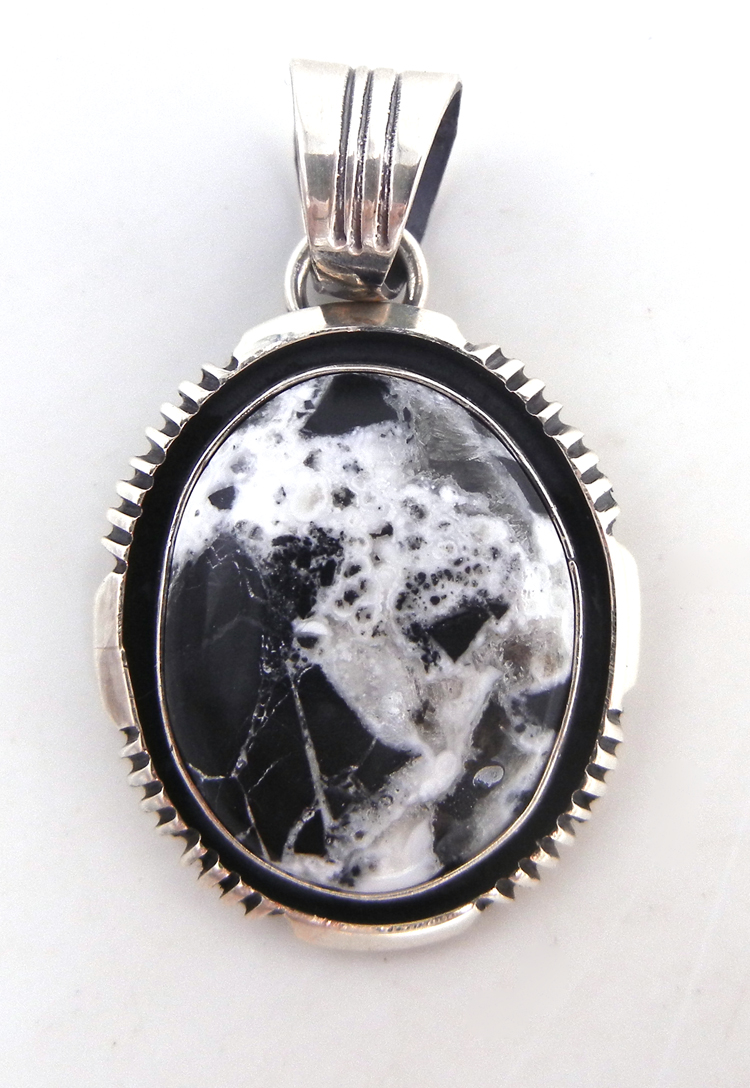 Navajo small white buffalo and sterling silver pendant by Will Denetdale