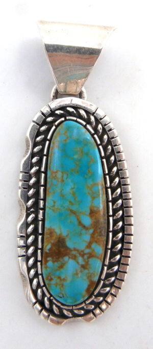 Navajo turquoise and sterling silver pendant by Walter Vandever