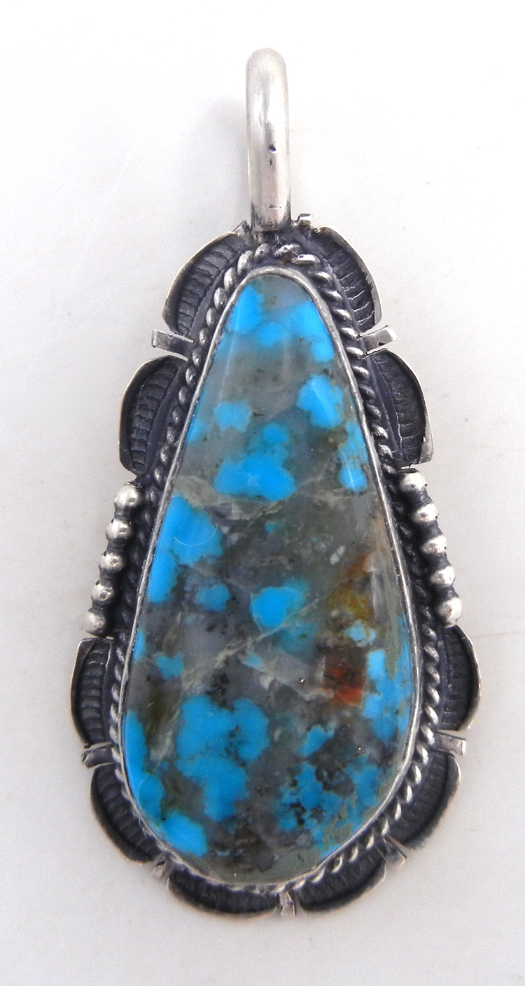 Navajo large turquoise and sterling silver pendant by Bennie Ration