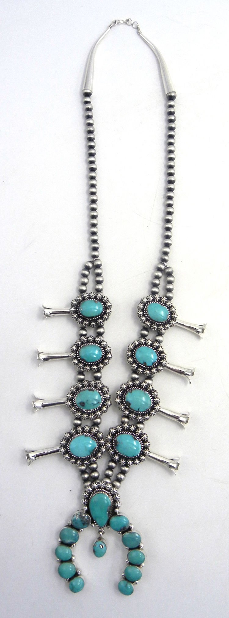 Navajo turquoise and sterling silver squash blossom necklace