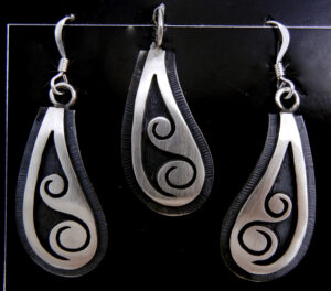 Hopi sterling silver overlay wave pattern earrings and pendant set