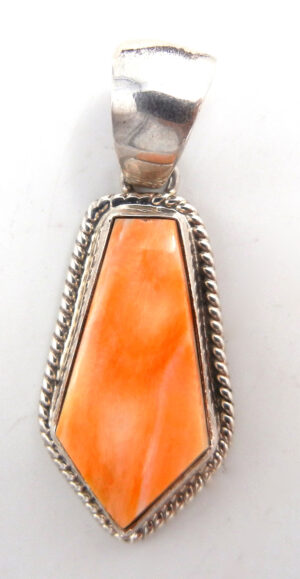 Navajo orange spiny oyster shell and sterling silver pendant