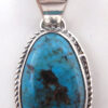 Navajo small turquoise and sterling silver pendant
