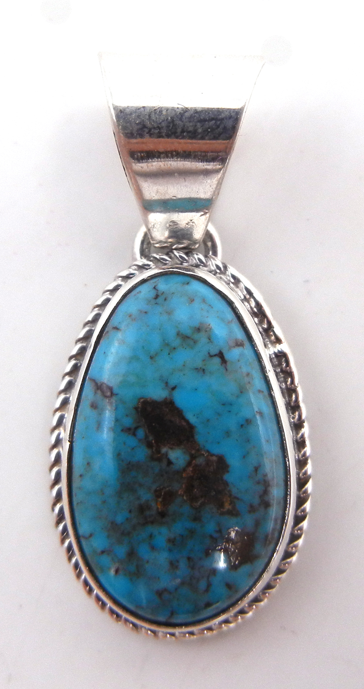 Navajo small turquoise and sterling silver pendant