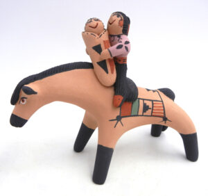 Jemez horse figurine with two children by Clifford Fragua