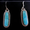 Navajo blue-green turquoise and sterling silver thin oval dangle earrings by Wydell Billie