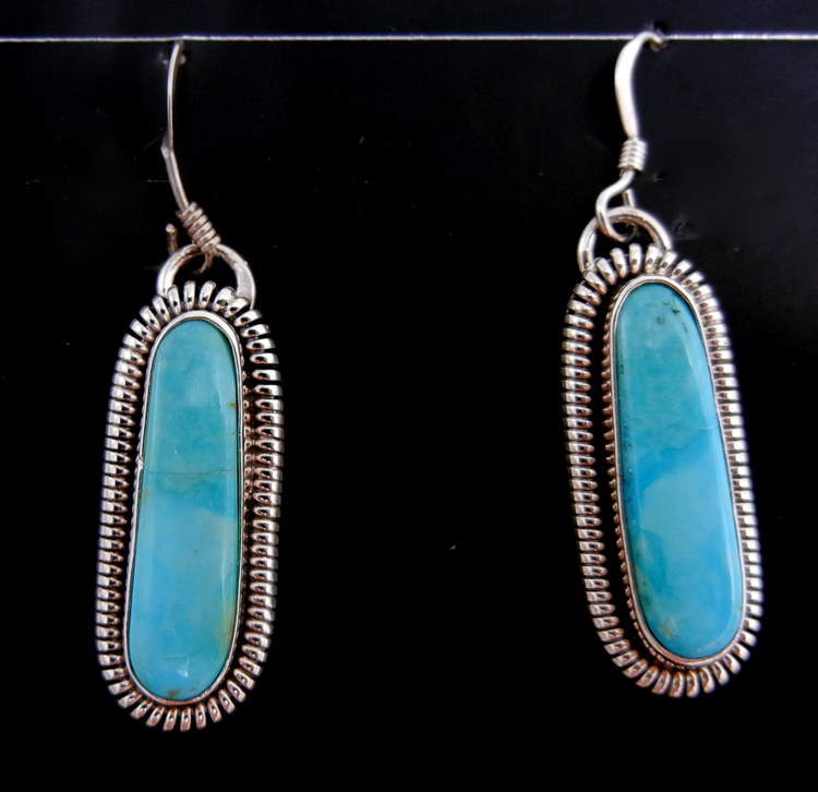 Navajo blue-green turquoise and sterling silver thin oval dangle earrings by Wydell Billie