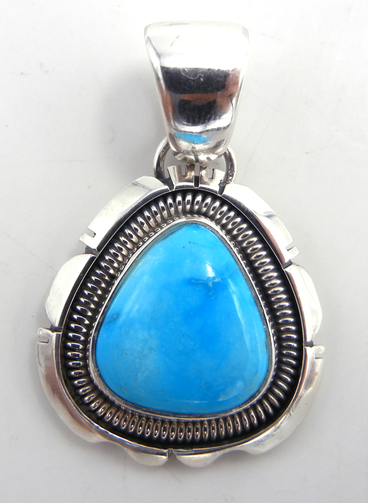 Navajo small turquoise and sterling silver pendant by Wydell Billie