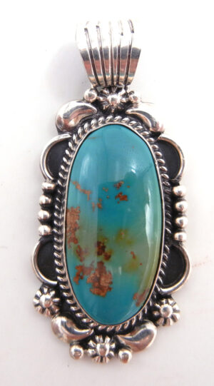 Navajo oval blue-green turquoise and sterling silver pendant by Will Denetdale