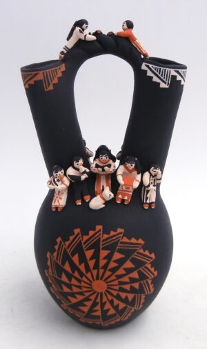 Cochiti/San Felipe handmade and hand painted wedding vase with thirteen children and dog by Dena Suina