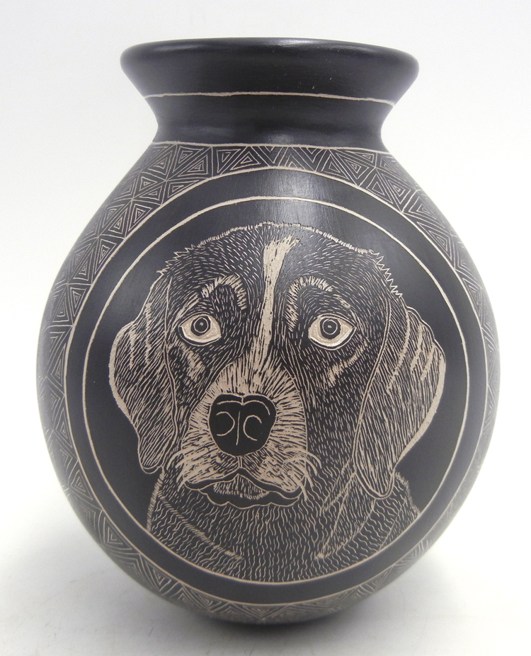 Mata Ortiz handmade and etched black and white dog and cat jar by Mariela Tena