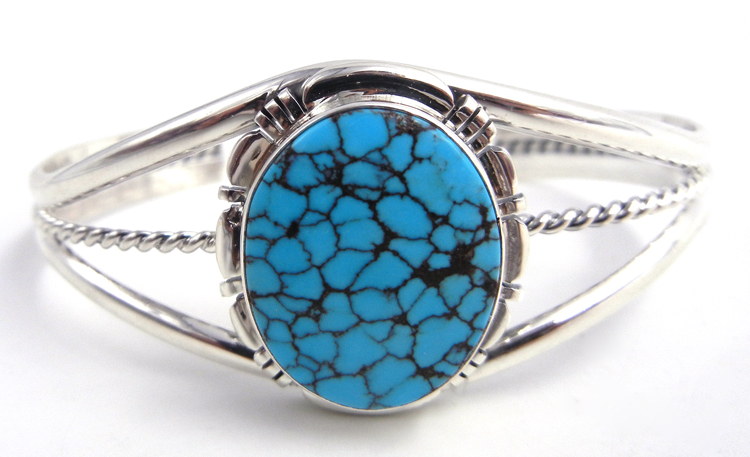 Navajo turquoise and sterling silver cuff bracelet with spiderwebbed matrix