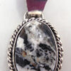 Navajo small white buffalo and sterling silver pendant