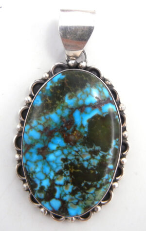 Navajo turquoise and sterling silver pendant by Juan Guerro