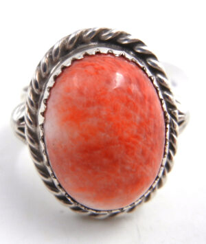 Navajo red spiny oyster shell and sterling silver ring by Delbert Delgarito