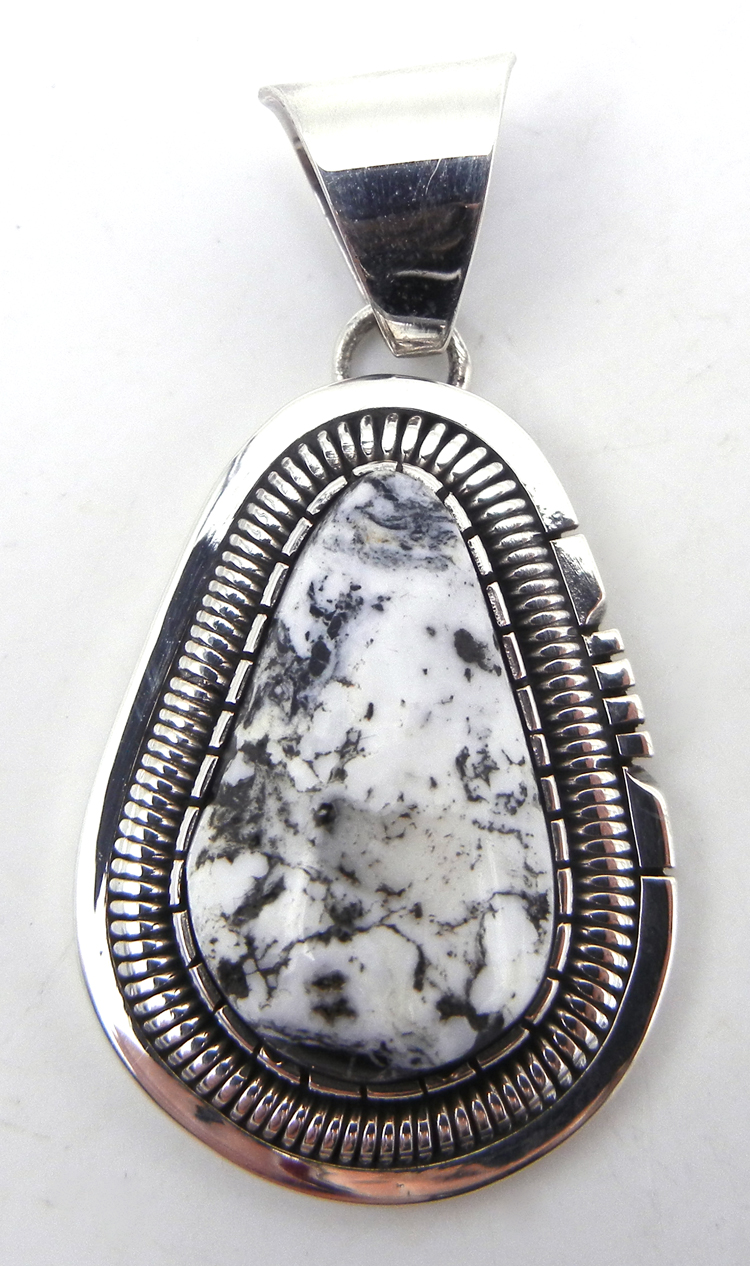 Navajo white buffalo and sterling silver pendant by Walter Vandever