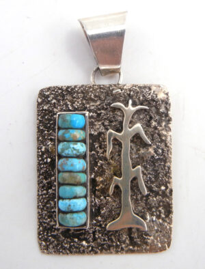 Navajo tufa cast sterling silver and turquoise pendant with cornstalk by Sandra Parkett