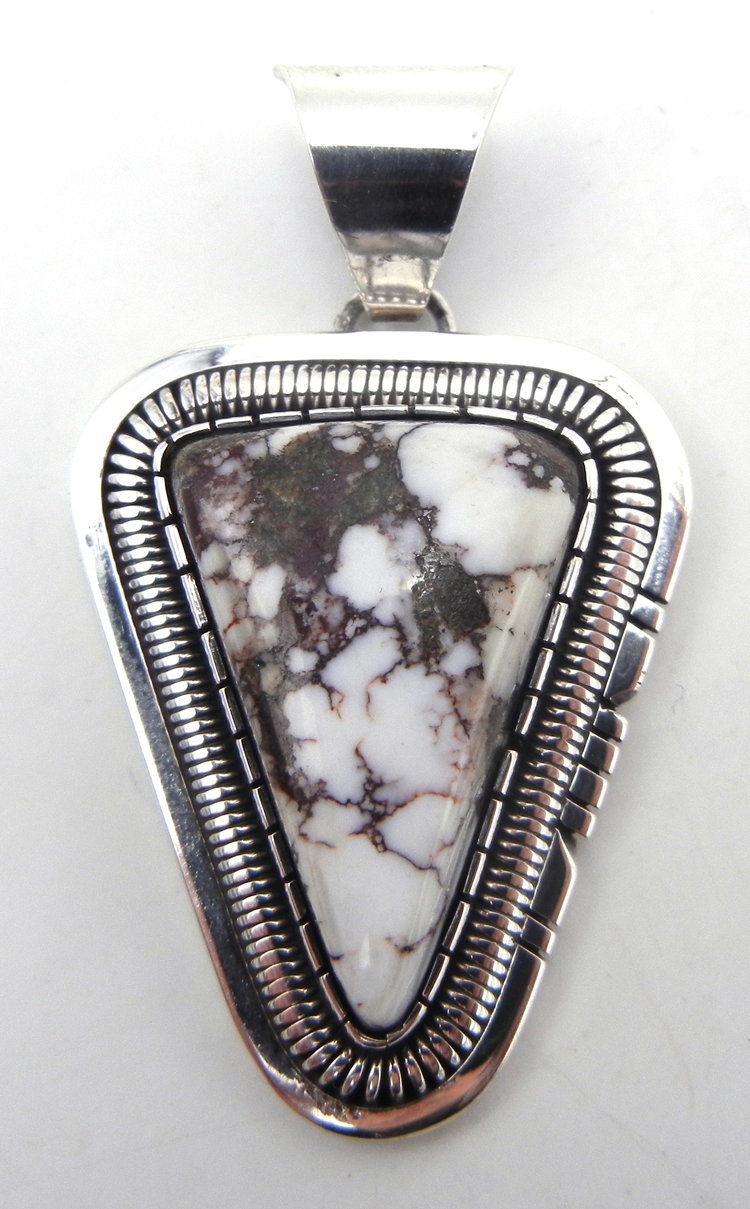 Navajo triangular wild horse and sterling silver pendant by Walter Vandever