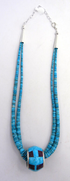 Santo Domingo double strand turquoise heishi necklace with inlaid turquoise, magenta and sterling silver slide.