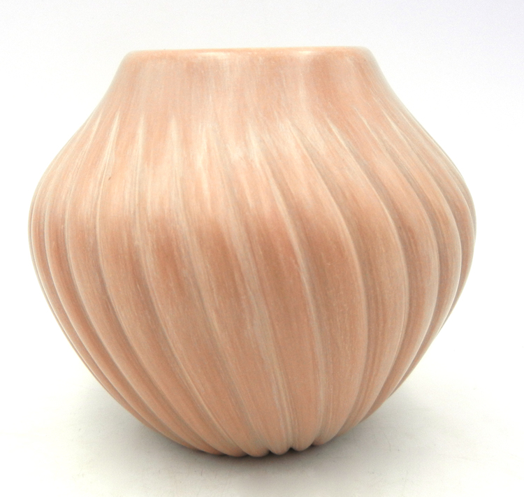 Jemez handmade and polished buff melon jar with square rim by Laura Gachupin.