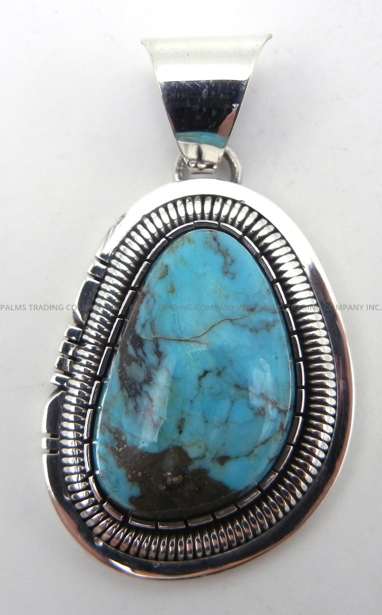 Navajo turquoise and sterling silver pendant by Walter Vandever