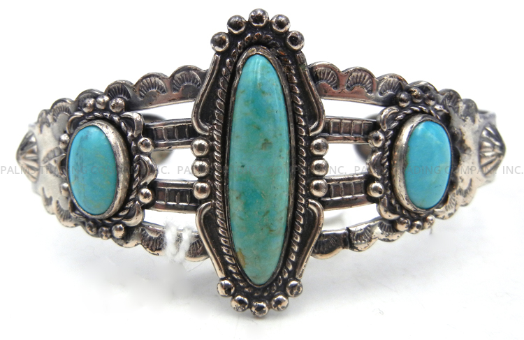 Navajo vintage Bell manufacturing three stone turquoise and sterling silver cuff bracelet, circa 1960s