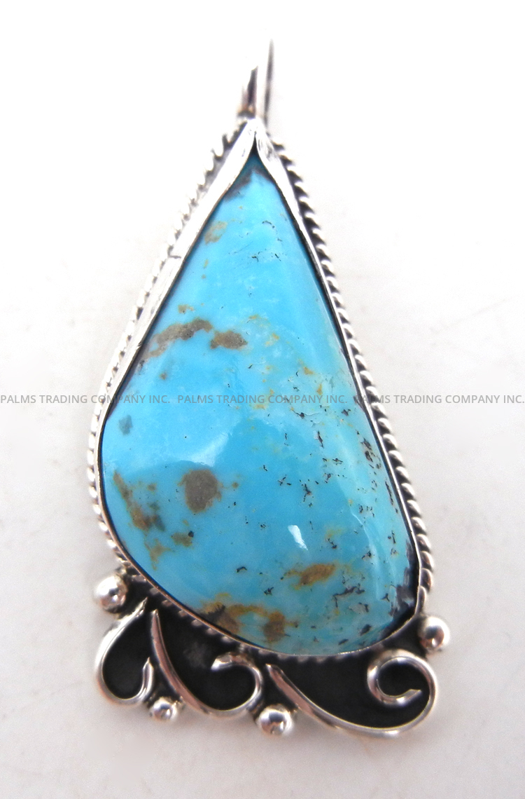 Navajo turquoise and sterling silver pendant by Juan Guerro
