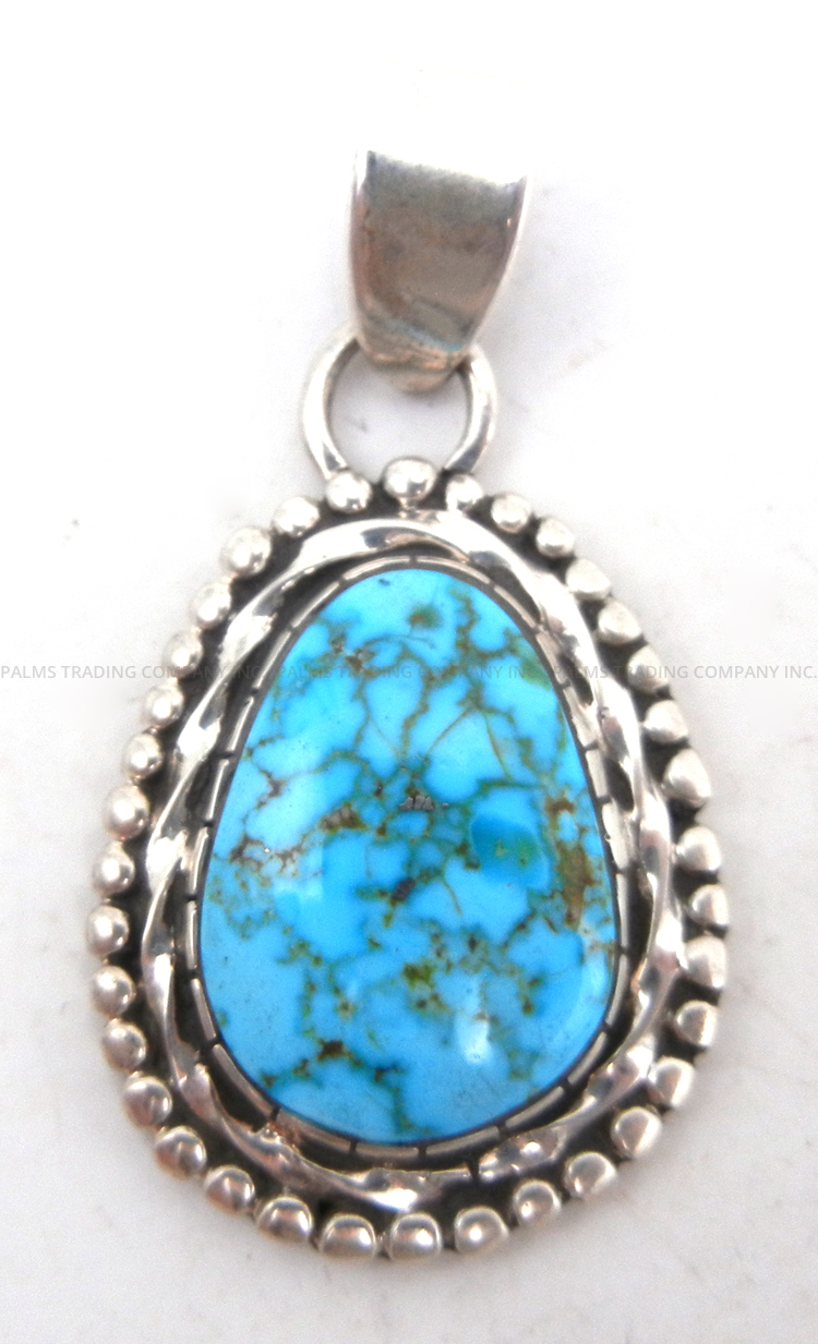 Zuni turquoise and sterling silver pendant by Abraham Peina