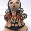 Jemez seated storyteller figurine with three children by Vernida Toya